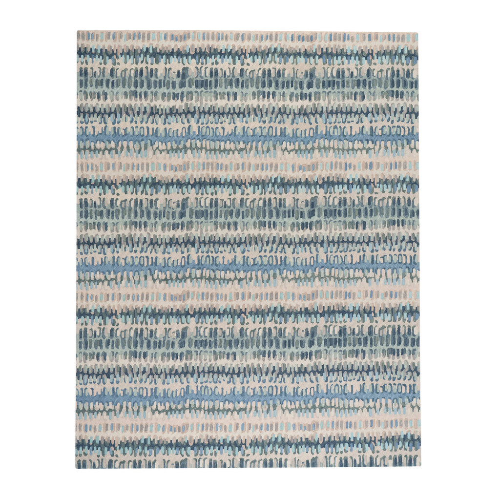 Blue abstract rug detail showing bold paint chip brushstroke pattern in navy and cobalt blue