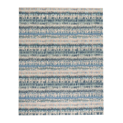 Blue abstract rug detail showing bold paint chip brushstroke pattern in navy and cobalt blue