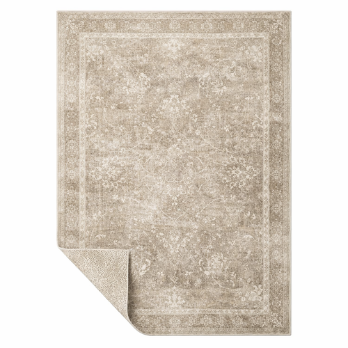 Neutral Persian medallion rug detail showing distressed beige and ivory pattern