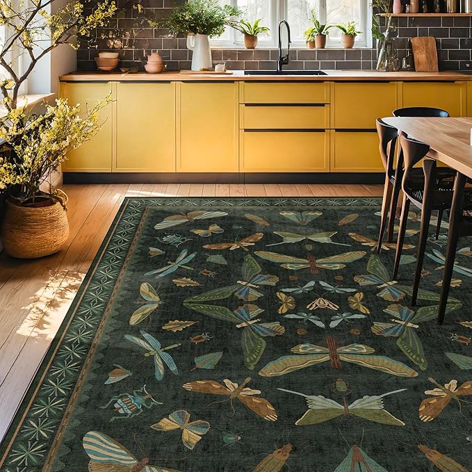 Botanical floral rug detail showing flowers, foliage and butterfly motifs on a dark green ground